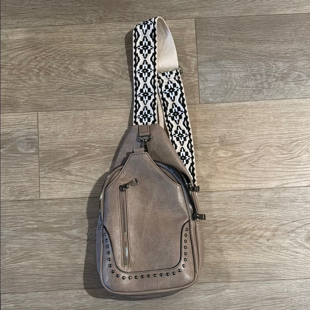 Chic Taupe Sling Bag with Black and White Strap
